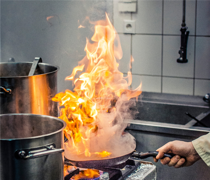 restaurant frying pan on fire